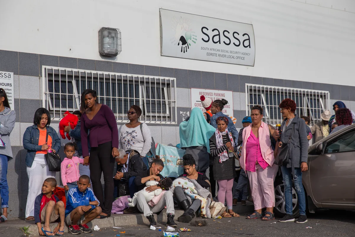 People queue outside the SASSA office in Eerste River, 10 October 2018.